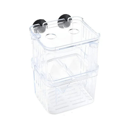 Clear plastic aquarium breeder box with suction cups and ventilation holes