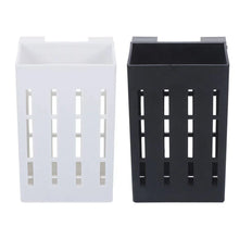 Set of two rectangular plastic storage holders in white and black with vertical slots