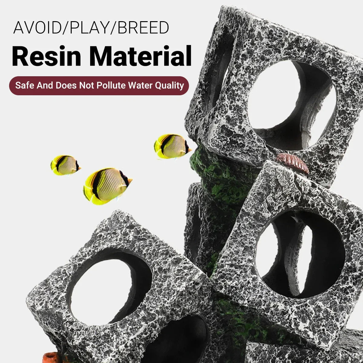 Stacked aquarium resin rock cubes with holes, yellow tropical fish swimming nearby