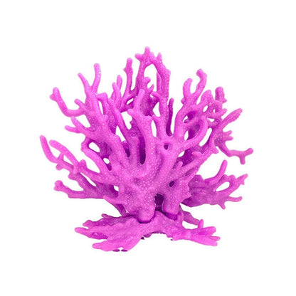 Artificial purple coral aquarium decoration with textured branches on white background