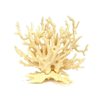 Decorative artificial coral ornament with detailed cream branches on white background