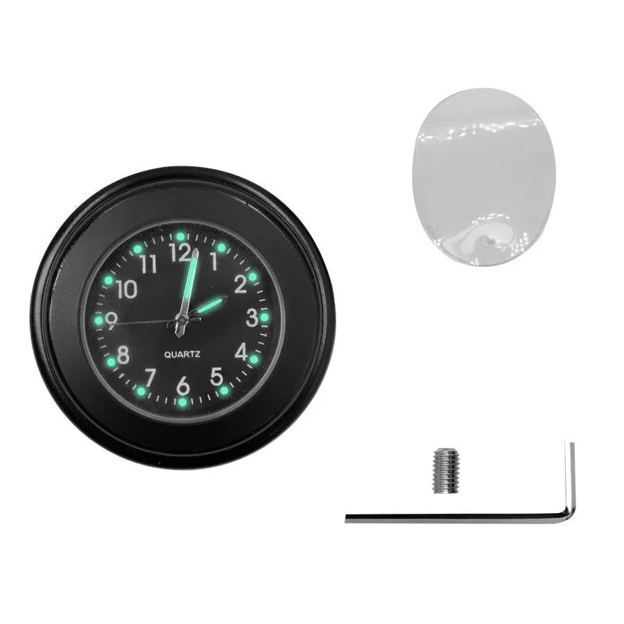 Black round quartz clock with glow-in-the-dark dial, adhesive pad, screw, and hex key