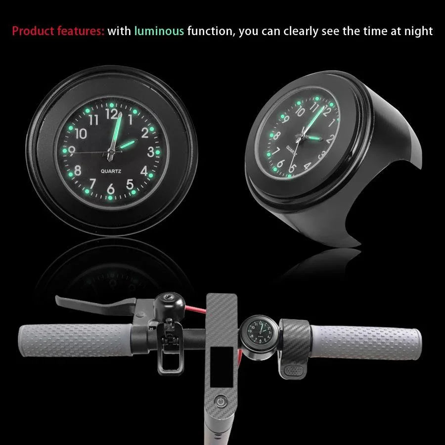 Luminous black handlebar clock for bike or scooter, mounted on grey handlebar.