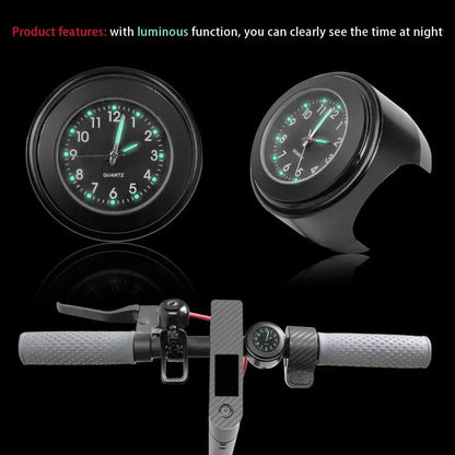 Luminous black handlebar clock for bike or scooter, mounted on grey handlebar.