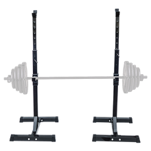 Black adjustable squat rack with barbell and weight plates for home gym strength training