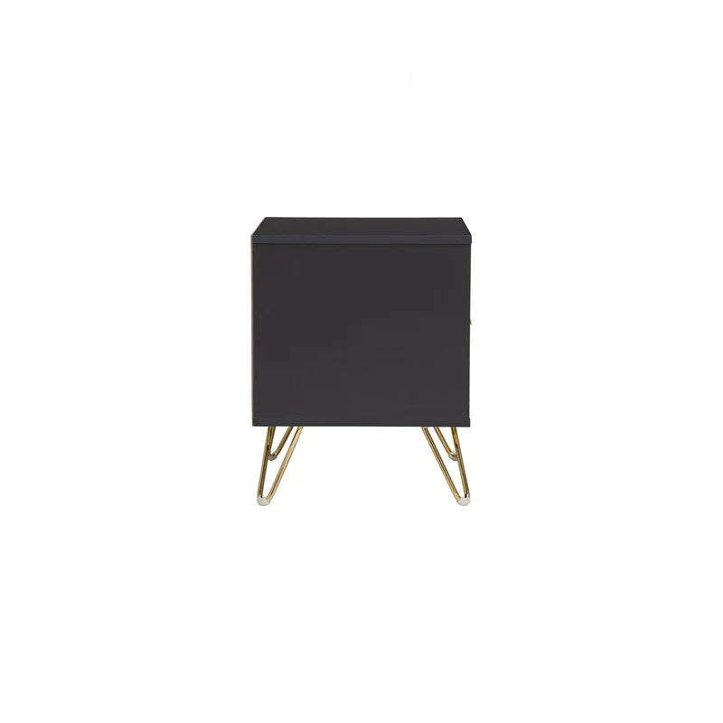Black modern nightstand with gold metal legs on white background