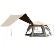 Large beige camping tent with mesh windows and attached canopy for shade
