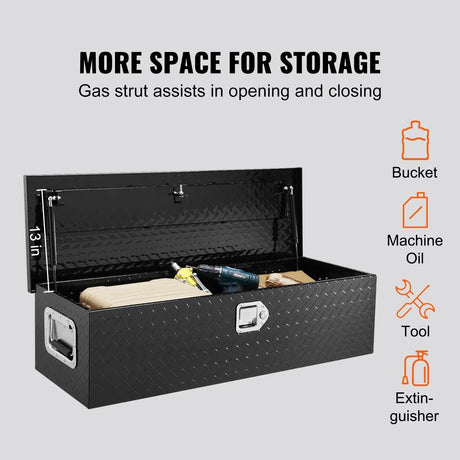 Black diamond plate truck tool box with gas struts and storage for bucket, machine oil, tools, and extinguisher