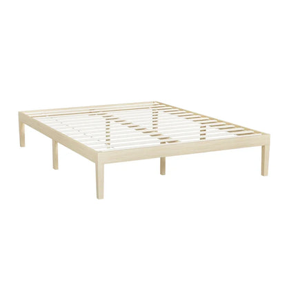 Natural wood platform bed frame with slatted base and legs on white background