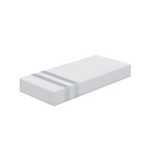 White memory foam mattress with two gray stripes on one end isolated on white background