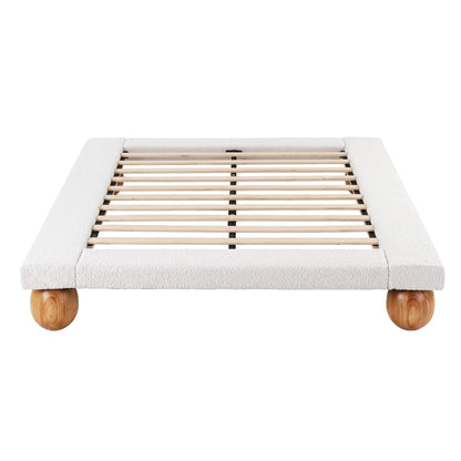 High-density padding around the upholstered perimeter gives a cushioned edge