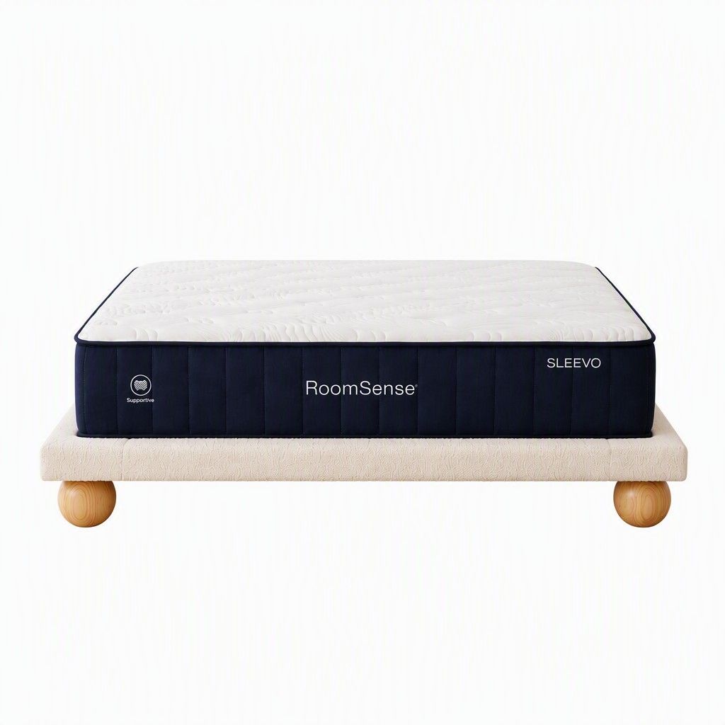 Solid rubberwood legs under a boucle upholstered queen bed frame