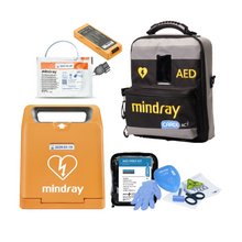 Mindray AED defibrillator kit with pads, battery, carry case, gloves, and prep accessories
